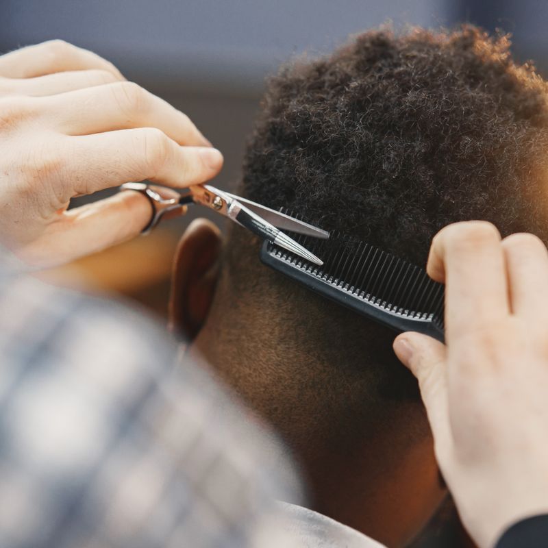 Scissor haircut and styling